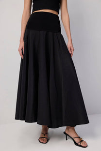 Gonna maxi a campana effetto cupro con vita a corsetto