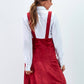 Abito salopette in velluto rosso