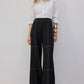 Pantaloni neri con cuciture a contrasto
