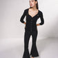 Cardigan in maglia a coste con catene dorate