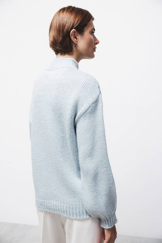 Maglione in maglia strutturata a trecce con collo alto