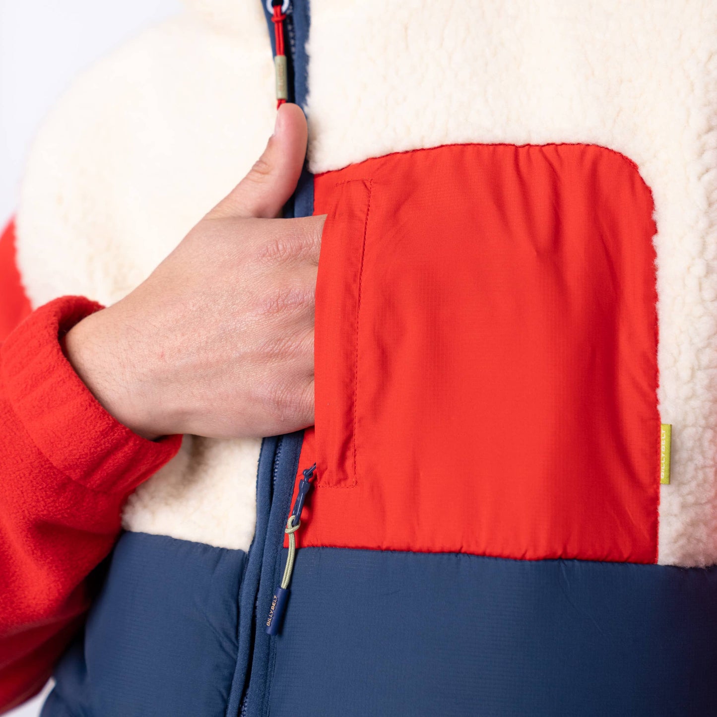 Gilet smanicato sherpa color block avorio e blu navy
