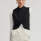 Gilet nero in crêpe con volant in chiffon