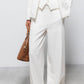 Pantaloni a gamba larga con zip laterale