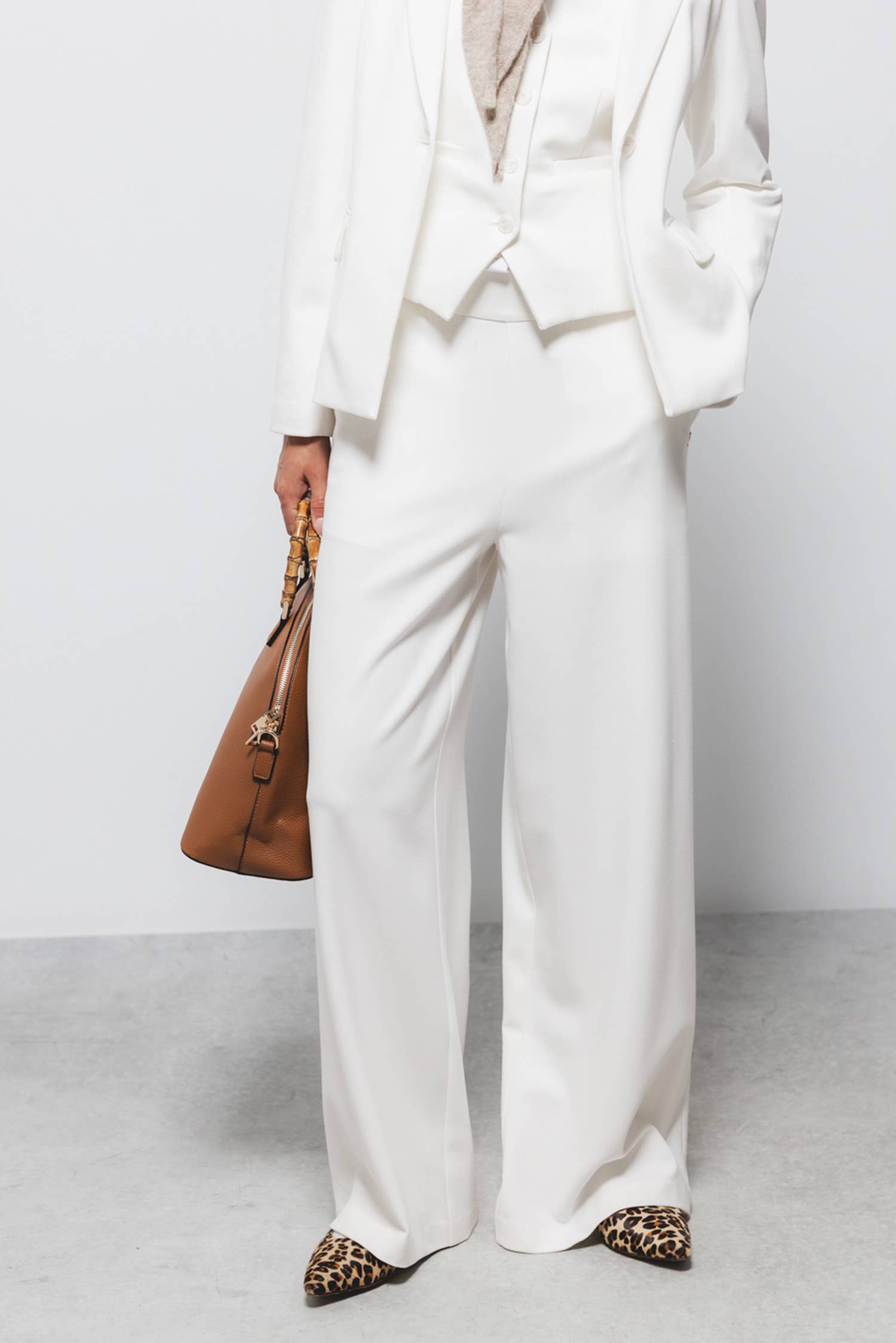 Pantaloni a gamba larga con zip laterale