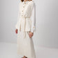 Gilet aderente crema con bottoni dorati