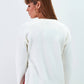 Maglione in maglia con fibbia laterale