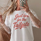 T-shirt oversize grafica “Just Here for the Tailgate”