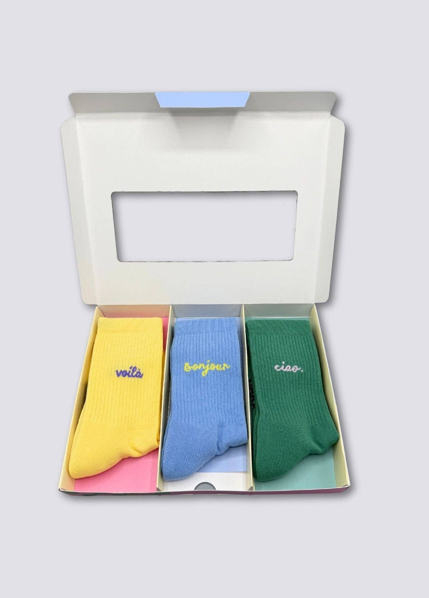 Set regalo di 3 paia di calze colorate con scritte Voilà, Bonjour e Ciao