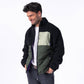 Giacca sherpa bicolore nera e verde