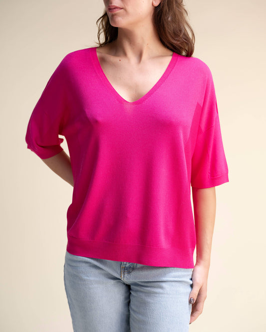Maglione in viscosa seamless con scollo a V e lavorazione 3D