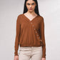 Maglione cache-cœur in maglia fine con perle