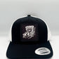Cappellino trucker nero con patch grafica