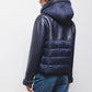 Giacca imbottita in eco-pelle con cappuccio e zip