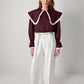 Camicia bordeaux con maxi colletto a contrasto e volant