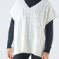 Gilet in maglia a trecce con scollo a V