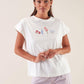 T-shirt bianca ricamata con fiori