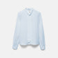 Blusa tinta unita con fiocco al collo