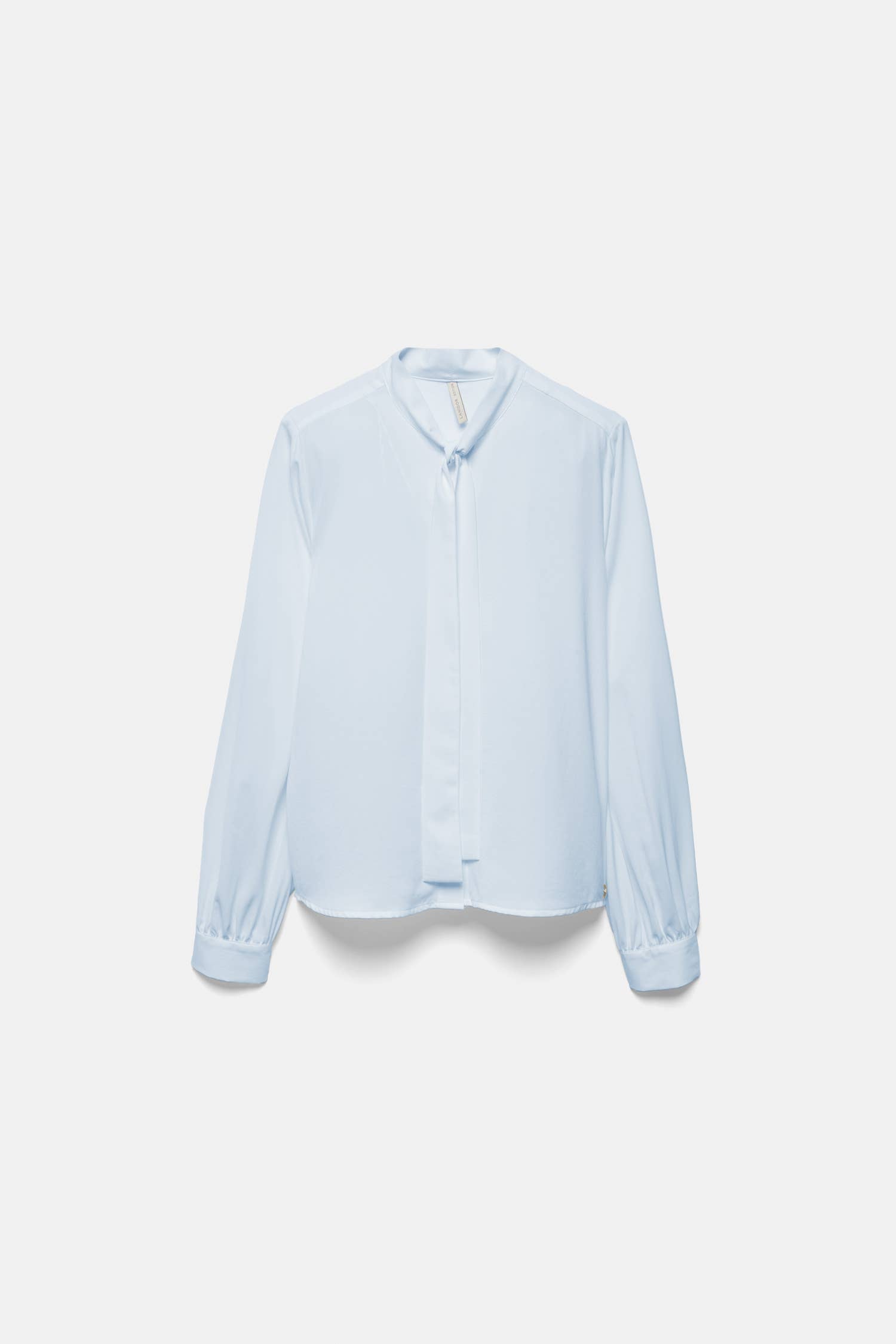 Blusa tinta unita con fiocco al collo