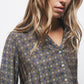 Blusa con motivo geometrico e scollo a V