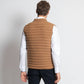 Gilet imbottito in lana merino con tasche color cammello