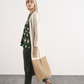 Cardigan lungo in maglia bicolore con tasche