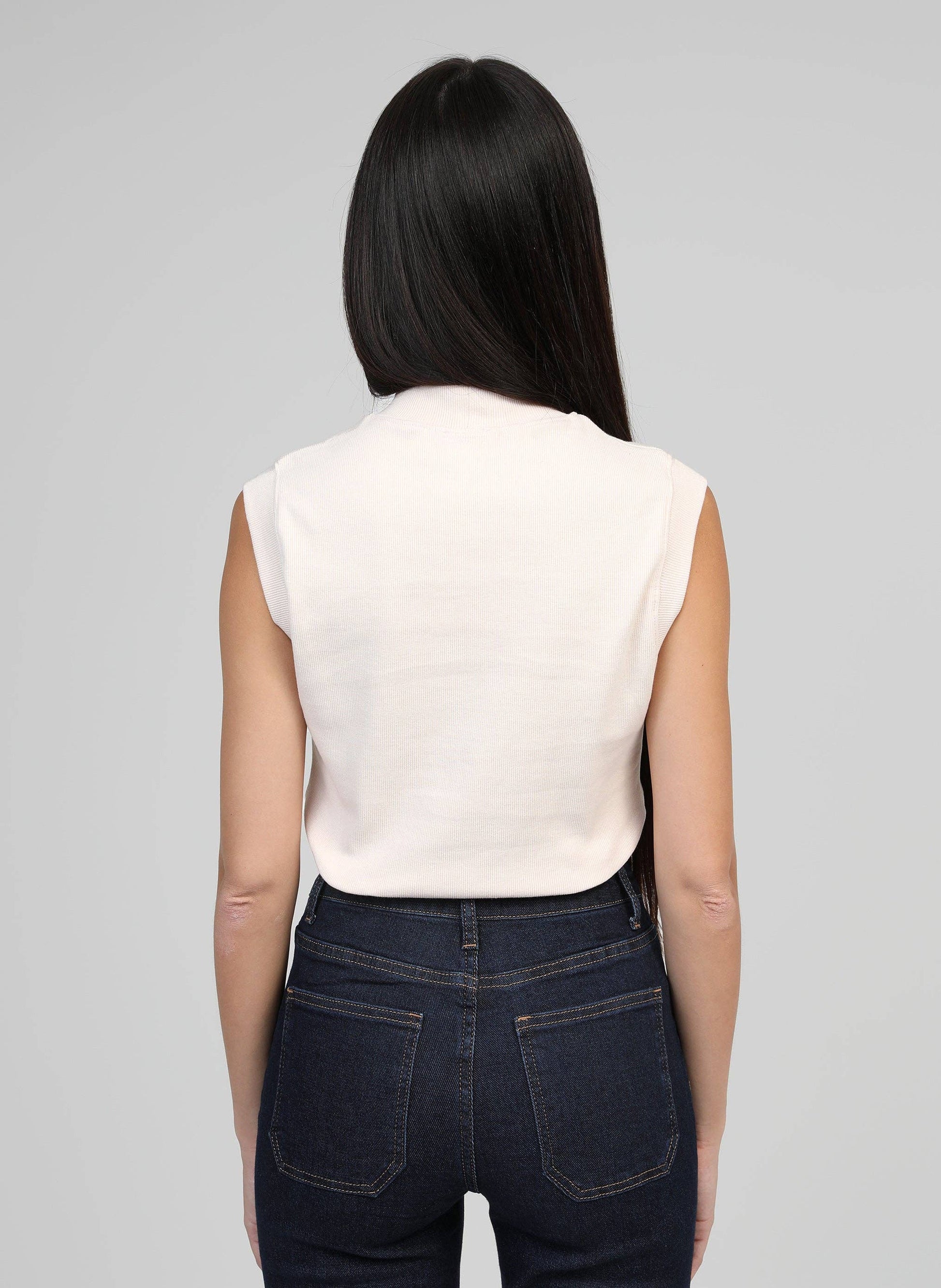 Canotta a coste con collo alto color vaniglia