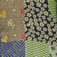Abito stampato patchwork con volant