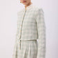 Completo in tweed con giacca corta e gonna lunga