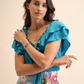 Top elasticizzato Folho con rouches e fiocco