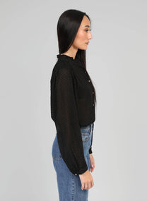 Blusa nera testurizzata con collo alla coreana