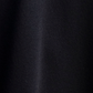 Top corto in maglia con frange sulle maniche