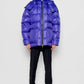 Piumino oversize viola con cappuccio removibile