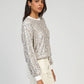 Maglione tricot con paillettes effetto glow