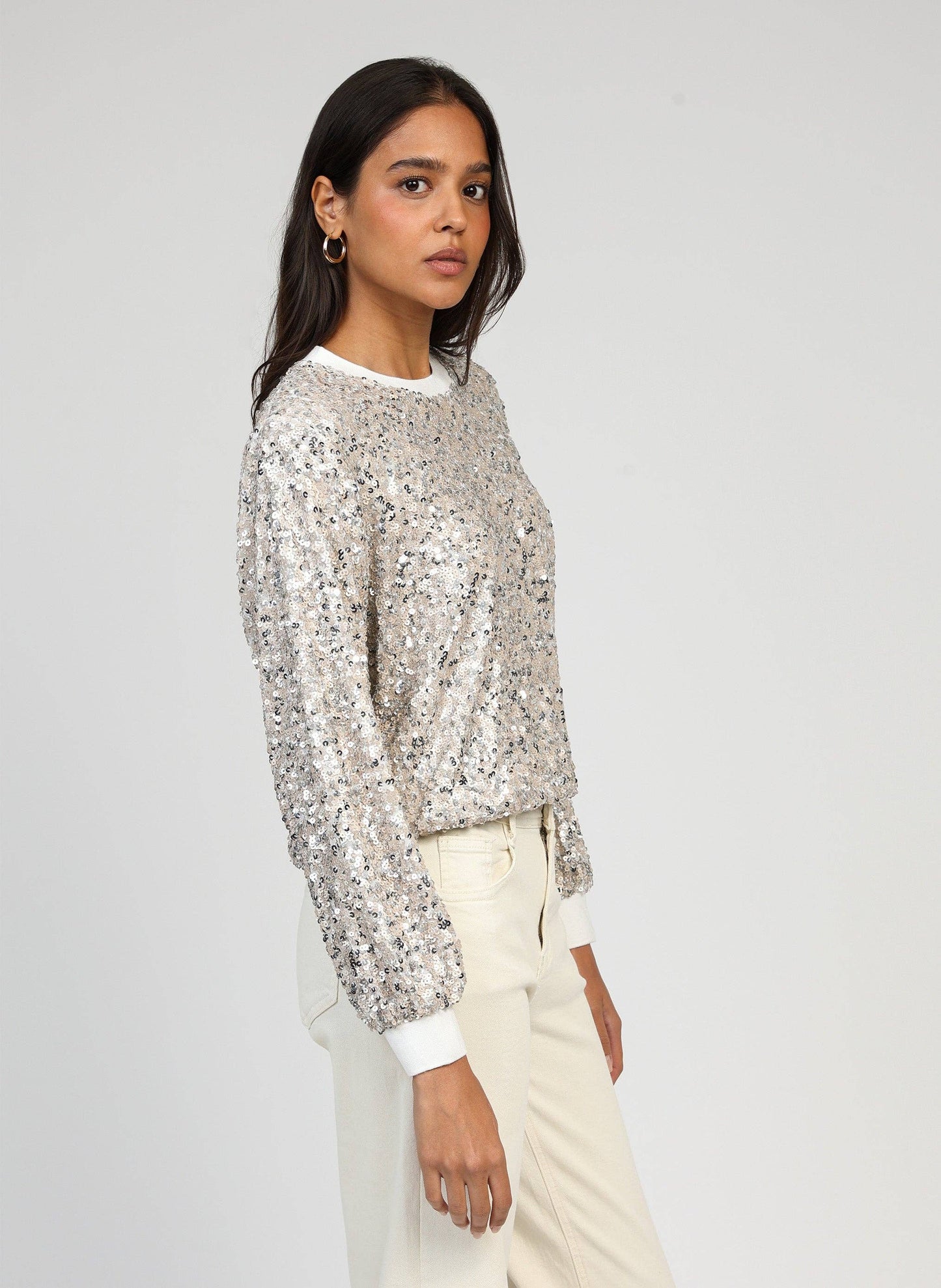 Maglione tricot con paillettes effetto glow