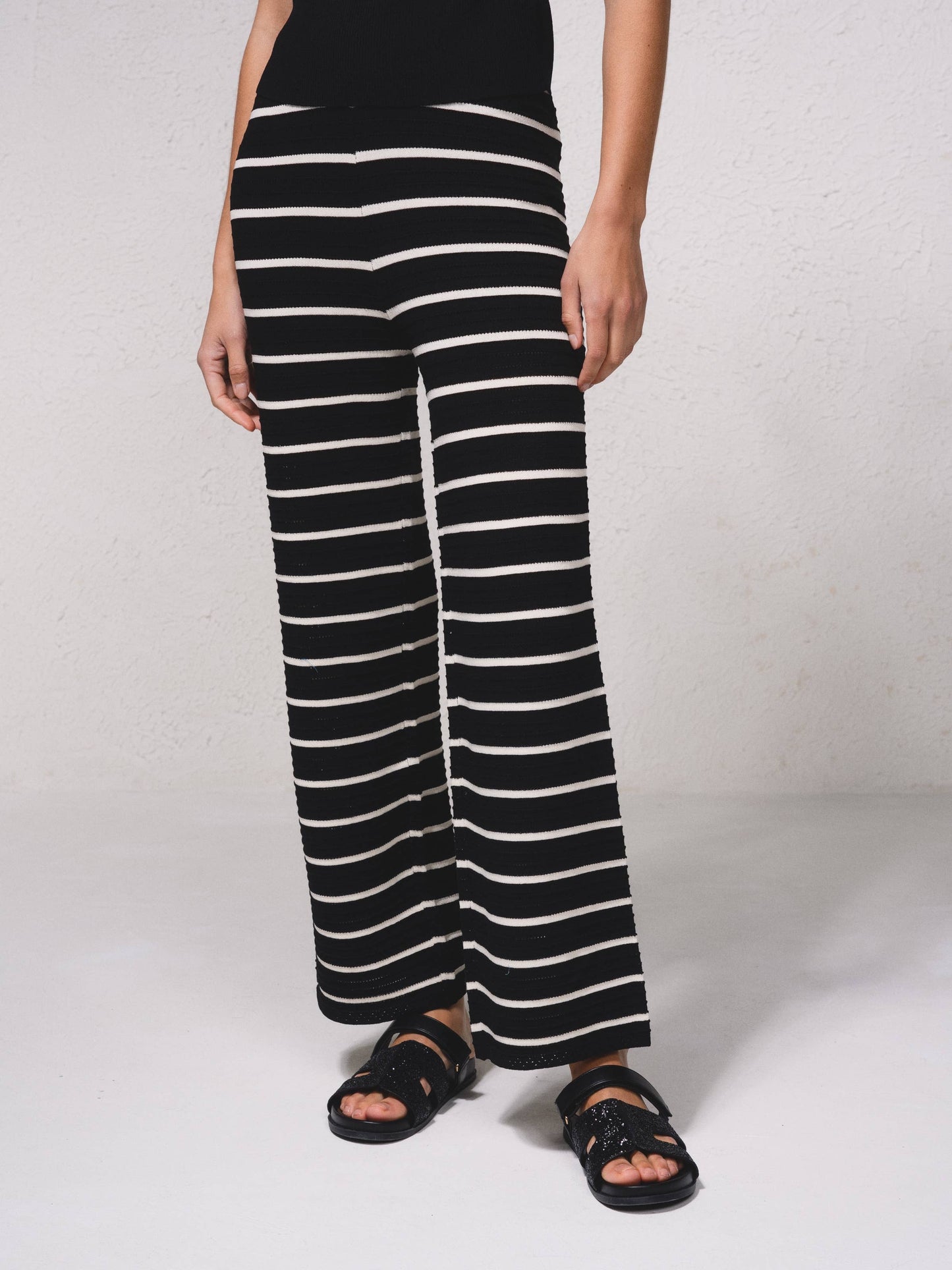 Pantaloni larghi in maglia a righe