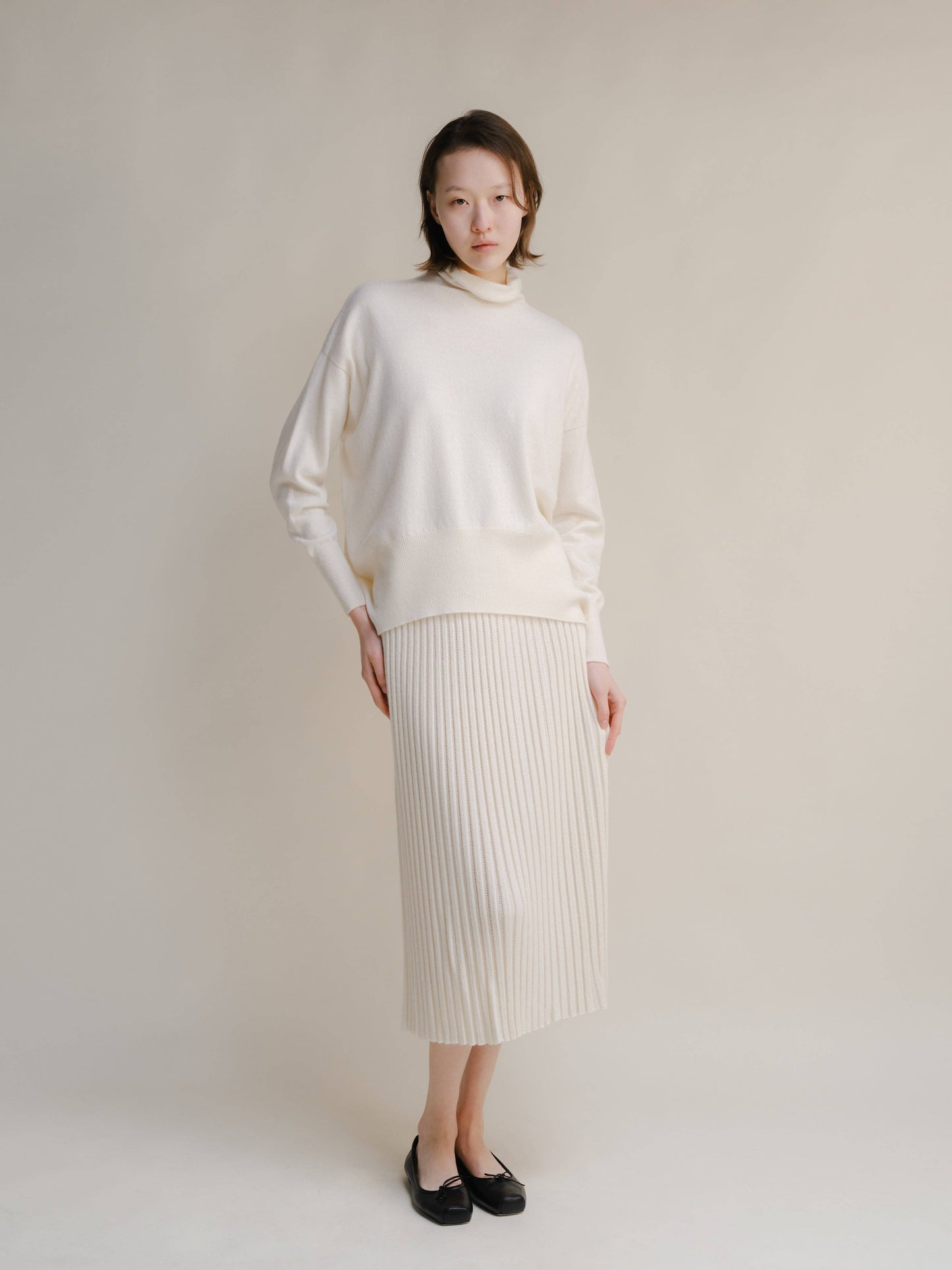 Gonna traforata in misto cashmere con maglia 3D