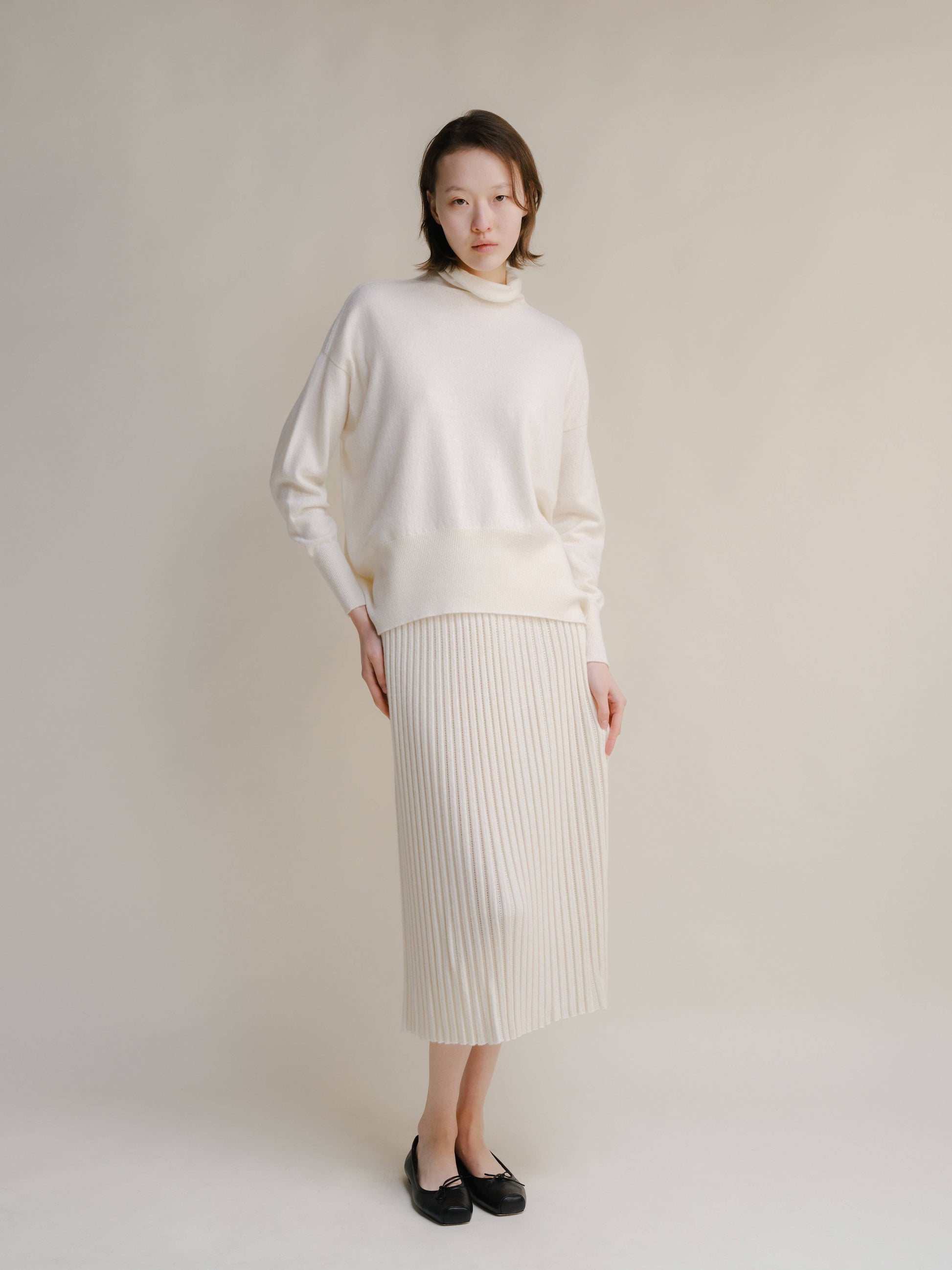 Gonna traforata in misto cashmere con maglia 3D