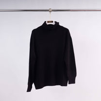 Maglione a collo alto in maglia con maniche aderenti