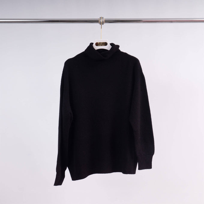 Maglione a collo alto in maglia con maniche aderenti