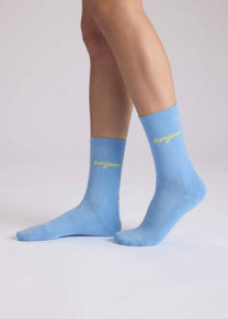 Calzini azzurro baby con scritta “Bonjour”