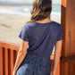T-shirt in lino con scollo rotondo e bottoncini