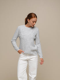 Maglione in maglia con applicazioni a foglia