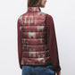 Gilet trapuntato con collo alto