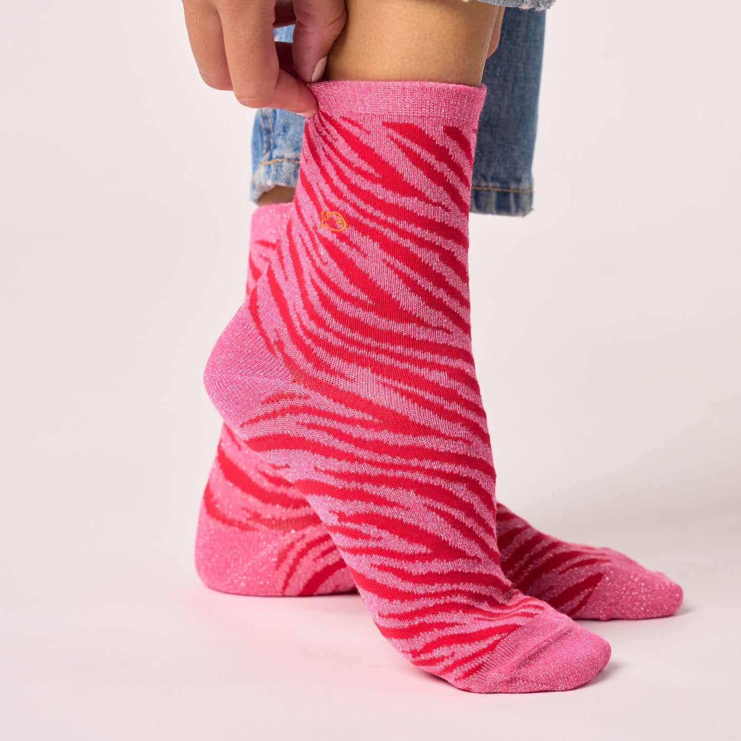 Calzini glitterati zebrati in cotone pettinato rosa e rosso
