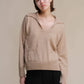 Polo oversize in tweed con tasche