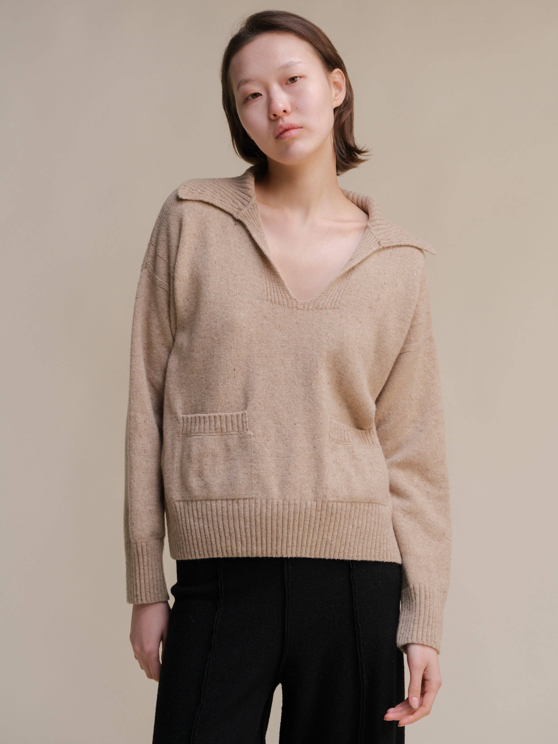 Polo oversize in tweed con tasche