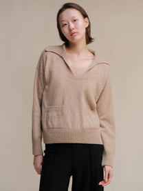 Polo oversize in tweed con tasche