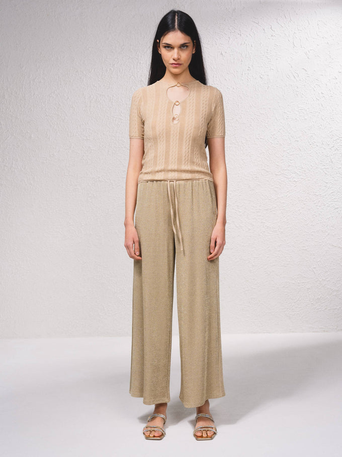 Top in maglia lurex con cut-out frontale