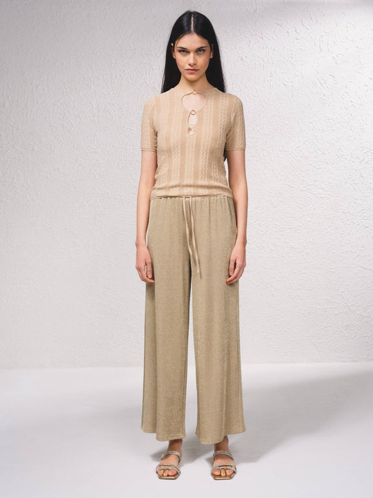 Top in maglia lurex con cut-out frontale